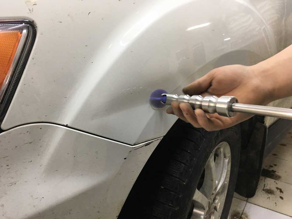 Как убрать вмятину на двери автомобиля: чем ее выпрямить?